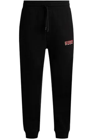 HUGO BOSS Cotton-terry tracksuit bottoms with logo print