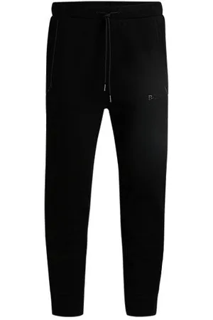 HUGO BOSS Cotton-blend tracksuit bottoms with mirror-effect logo