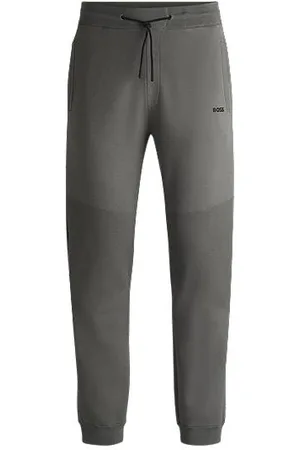 HUGO BOSS Regular-fit knitted tracksuit bottoms with stripes and branding