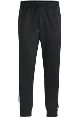 HUGO BOSS Relaxed-fit tracksuit bottoms with jacquard-woven circles