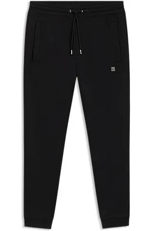 HUGO BOSS Cotton-blend tracksuit bottoms with stacked logo