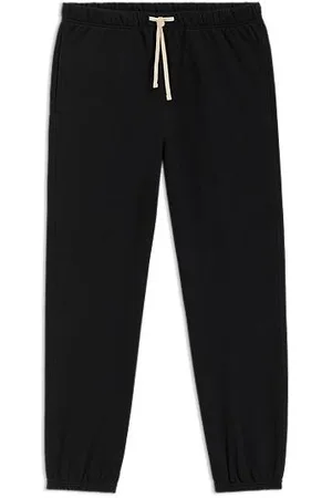 HUGO BOSS BECKHAM x relaxed tracksuit bottoms in cotton terry