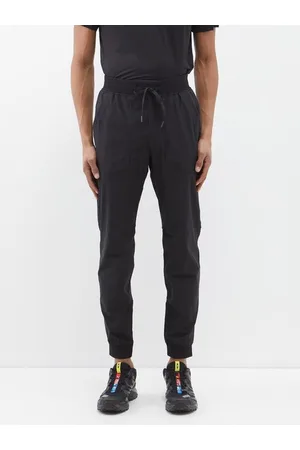 Black Surge recycled-fibre jersey track pants, Lululemon
