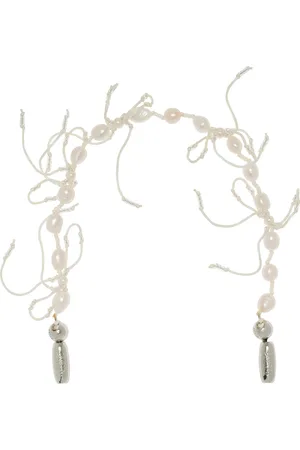 Ossa Pearl and Bow Wristlet Phone Strap - - OS - Moda Operandi