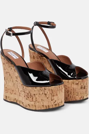 Alaïa AlaÃ¯a Patent leather wedge sandals