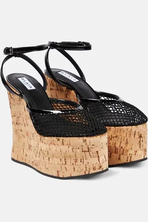 Alaïa AlaÃ¯a Patent leather and mesh wedge sandals