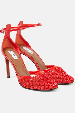 Alaïa AlaÃ¯a Studded mesh and leather pumps