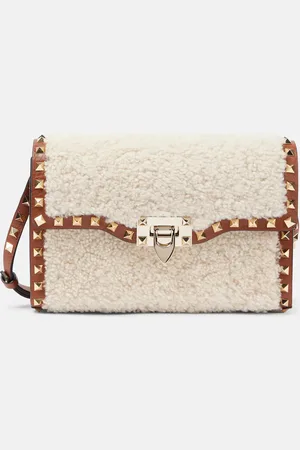 VALENTINO GARAVANI Rockstud Small shearling shoulder bag