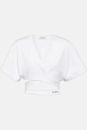 Alaïa AlaÃ¯a Logo cotton jersey crop top