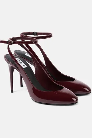 Alaïa AlaÃ¯a DÃ©colletÃ© 90 patent leather pumps