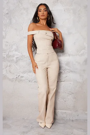 PRETTYLITTLETHING Petite Faux Leather Zip Front Flared Pants