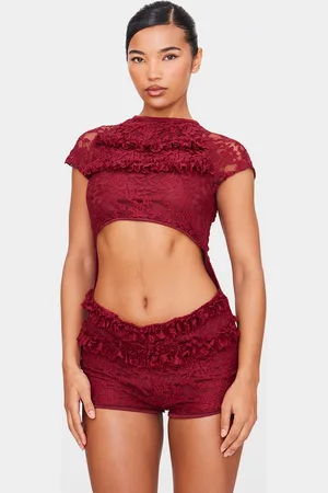 PRETTYLITTLETHING Lace Ruffle Detail Cut Out Rara Skort Playsuit