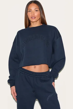 PRETTYLITTLETHING Tall Distressed Detail Varsity Cropped Sweatshirt
