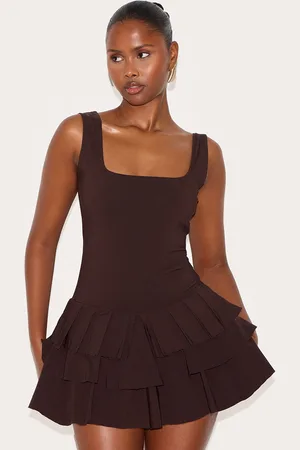 PRETTYLITTLETHING Stretch Woven Pleated Skort Playsuit