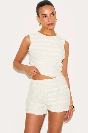 PRETTYLITTLETHING Petite Textured Hot Pants