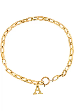 Martha Calvo Initial Lariat in . Size E, I, N, O, P, S.