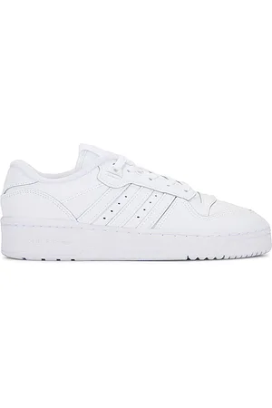 adidas Rivalry Low Sneaker in . Size 10.5, 9.5, Mens 10 / Womens 11, Mens 10.5 / Womens 11.5, Mens 12 / Womens 13, Mens 9 / Womens 10
