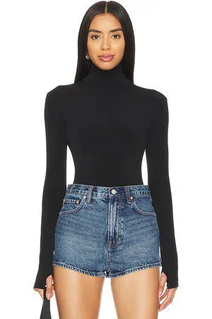 Norma Kamali Slim Fit Long Sleeve Turtleneck Top in . Size M, S, XS, XXS.