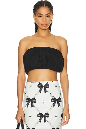 Milkwhite Mini Peplum Top in . Size M, S, XL, XS.