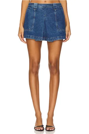 GRLFRND Ivy Pleated Mini Skirt in . Size 24, 25, 26, 27, 28, 29, 30, 32.