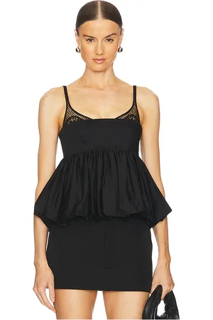 CLEA Mimi Peplum Top in . Size S, XS.