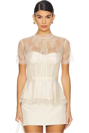 Simkhai Kehlani Lace Short Sleeve Bustier Top in . Size 2, 4, 6.