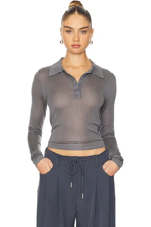 Lioness Black Swan Polo in . Size S, XS.