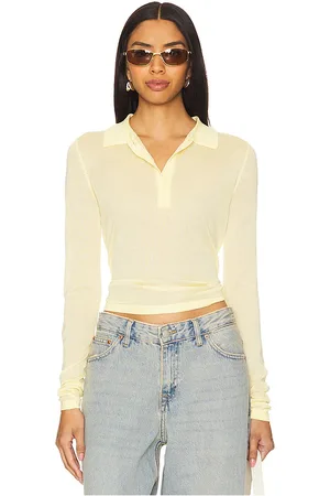 Lioness Black Swan Polo Top in . Size S, XS.