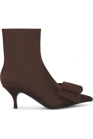 Jeffrey Campbell Bow-Tie Boots in . Size 6.5, 7, 7.5, 8, 8.5, 9.5.