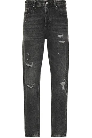 Tommy Hilfiger Isaac Relaxed Tapered Jeans in . Size 36.