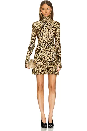 Norma Kamali Long Sleeve Turtleneck Fishtail Mini Dress in . Size M, S, XL, XS.