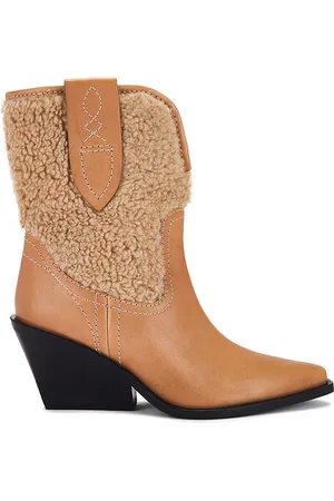 Free People Pitchfork Point Faux Fur Boot In Almond Butter in . Size 6, 6.5, 7, 7.5, 8, 8.5, 9, 9.5.