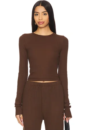 ÉTERNE Long Sleeve Fitted Top in . Size S, XL, XS.