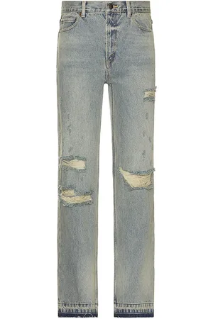 Midnight Distressed Denim Jeans in . Size 32, 34, 36.