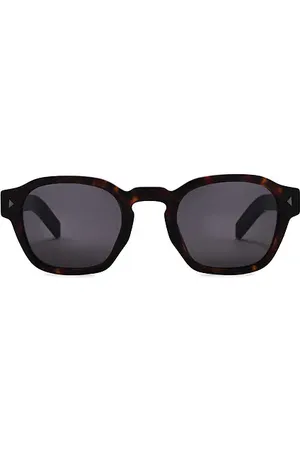 Prada Round Frame Sunglasses in Tortoise in .