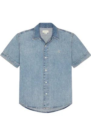 Calvin Klein Light Denim Shirt in . Size M, S, XL/1X.