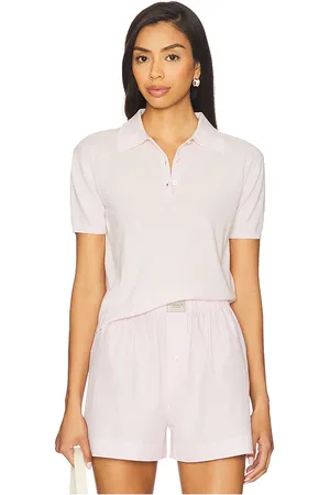 KULE Farley Polo Top in . Size M, S, XL, XS.