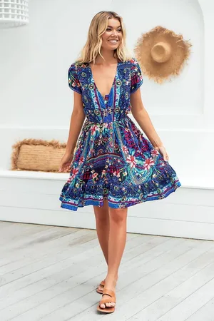Jaase Lizzie Mini Dress: Butterfly Cap Sleeve Button Down Dress with Pockets in Rocco Print