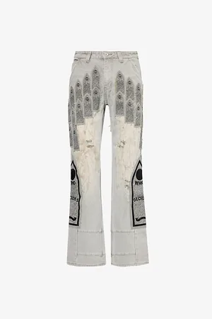 Who Decides War by Ev Bravado Distressed Branded-patch Denim Trousers