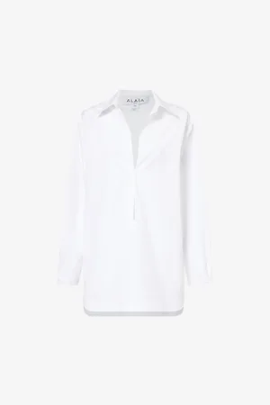 Alaïa Long-sleeved Side-pocket Cotton Mini Dress