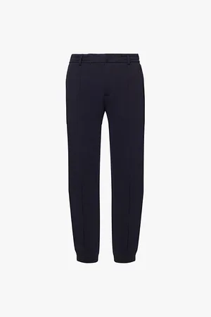 Emporio Armani Pleat-front Tapered-leg Regular-fit Cotton-blend Jersey Trousers