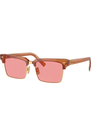 Miu Miu Woman Sunglasses MU 10ZS - Frame color: Caramel Trasparent, Lens color:
