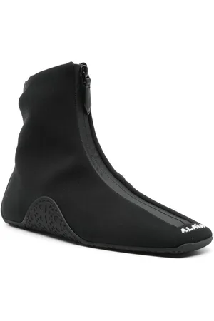 Alaïa Zipped Ankle Sneakers