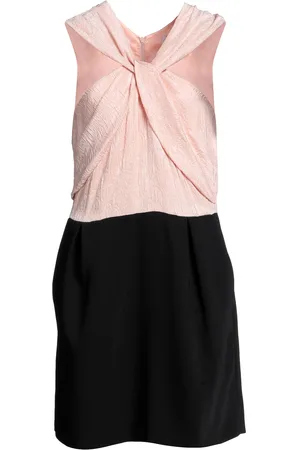 Patou Mini dresses