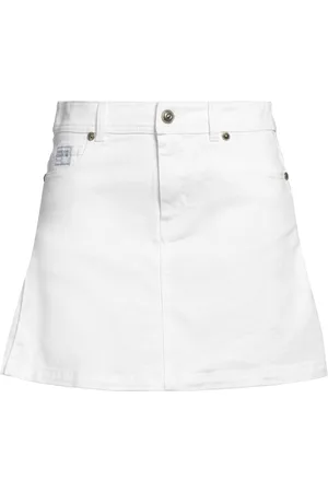 VERSACE Denim skirts