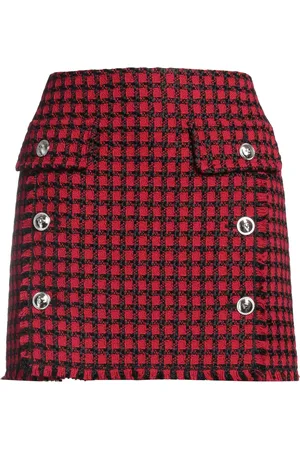 VERSACE Mini skirts