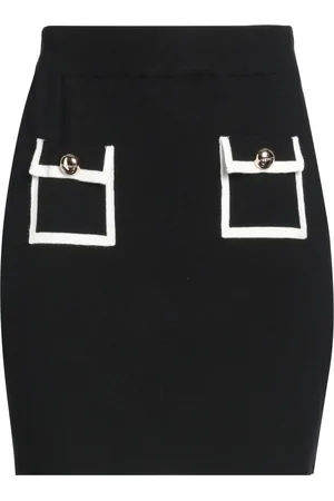NO SECRETS Mini skirts