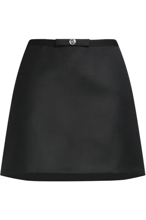 VERSACE Mini skirts